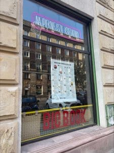 A calendar of events posted in the front window.